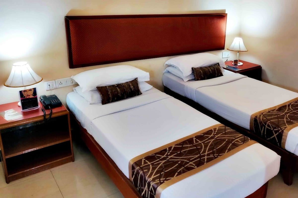 Economy Room, 1 Bedroom | Premium bedding, in-room safe, individually decorated