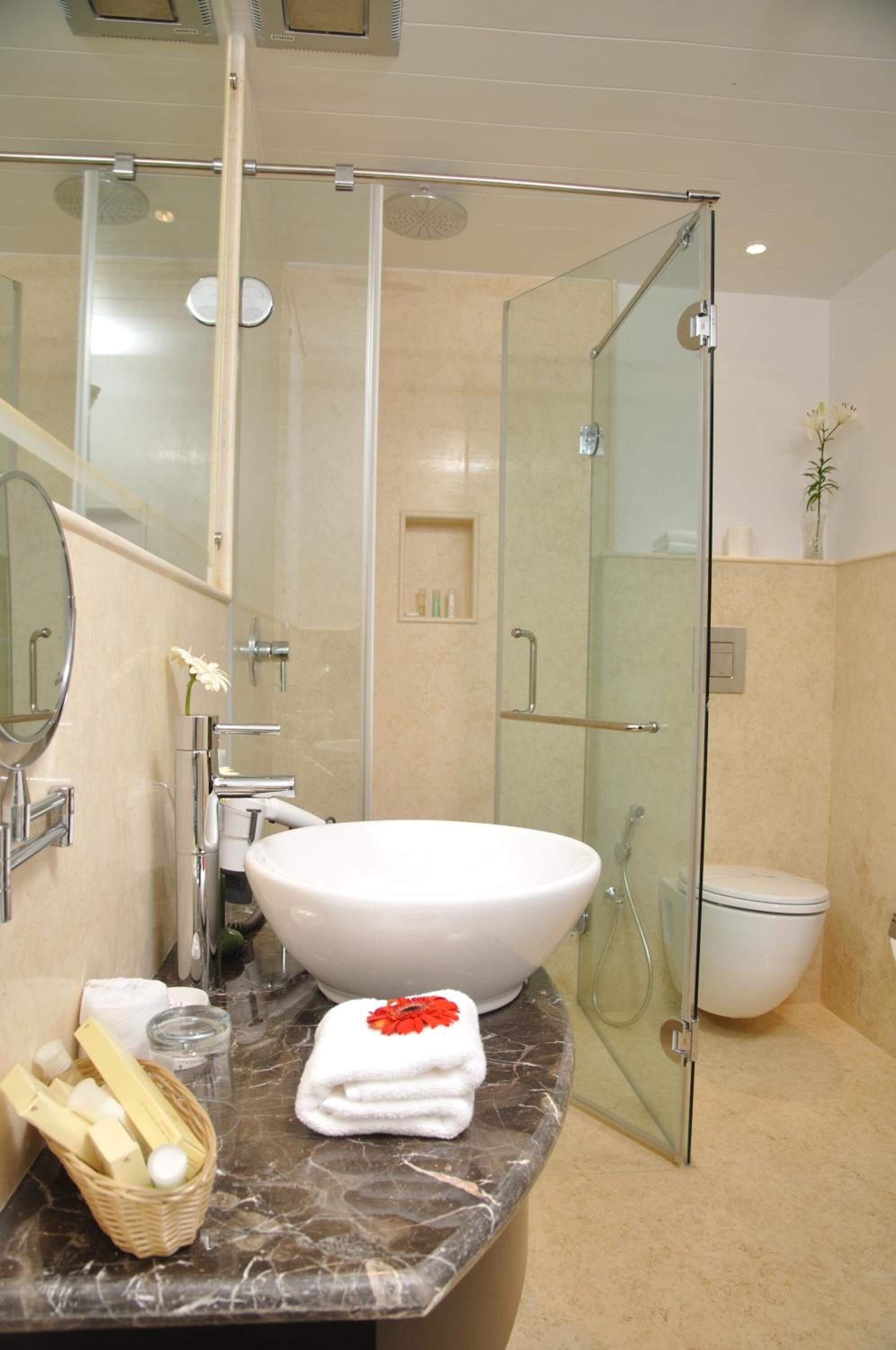suite | bathroom | rainfall showerhead, free toiletries, hair dryer, towels