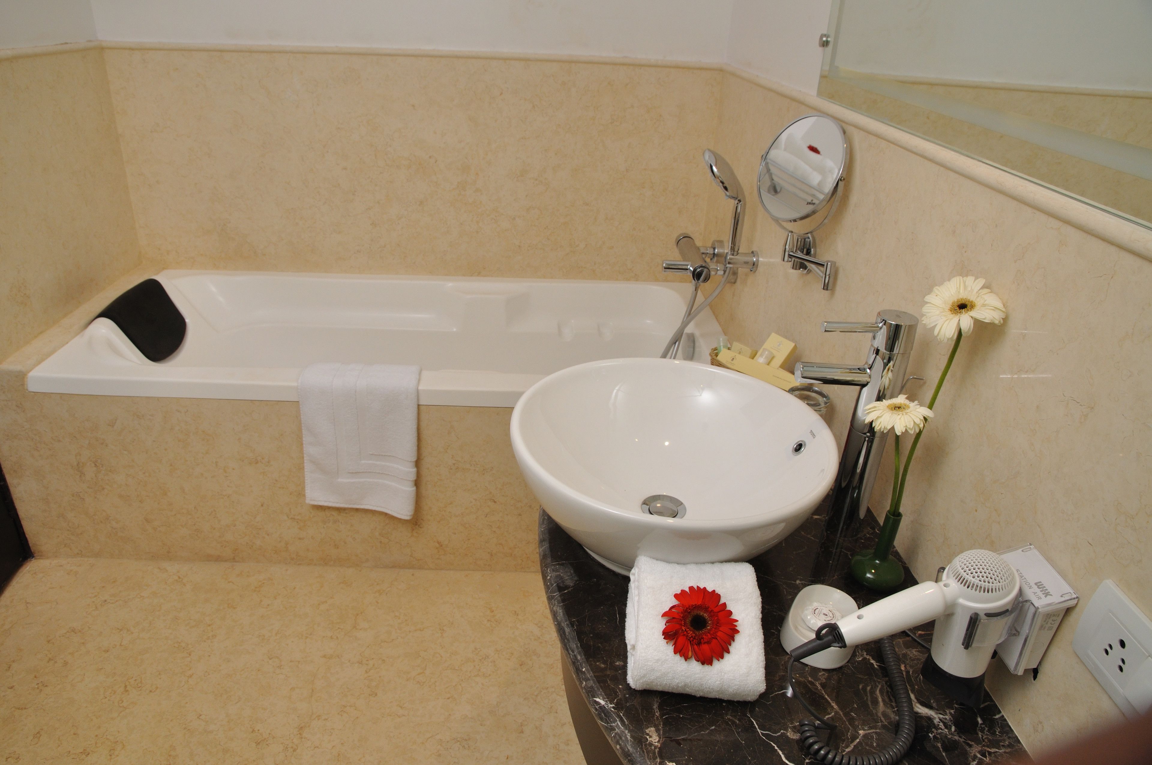 suite | bathroom | rainfall showerhead, free toiletries, hair dryer, towels