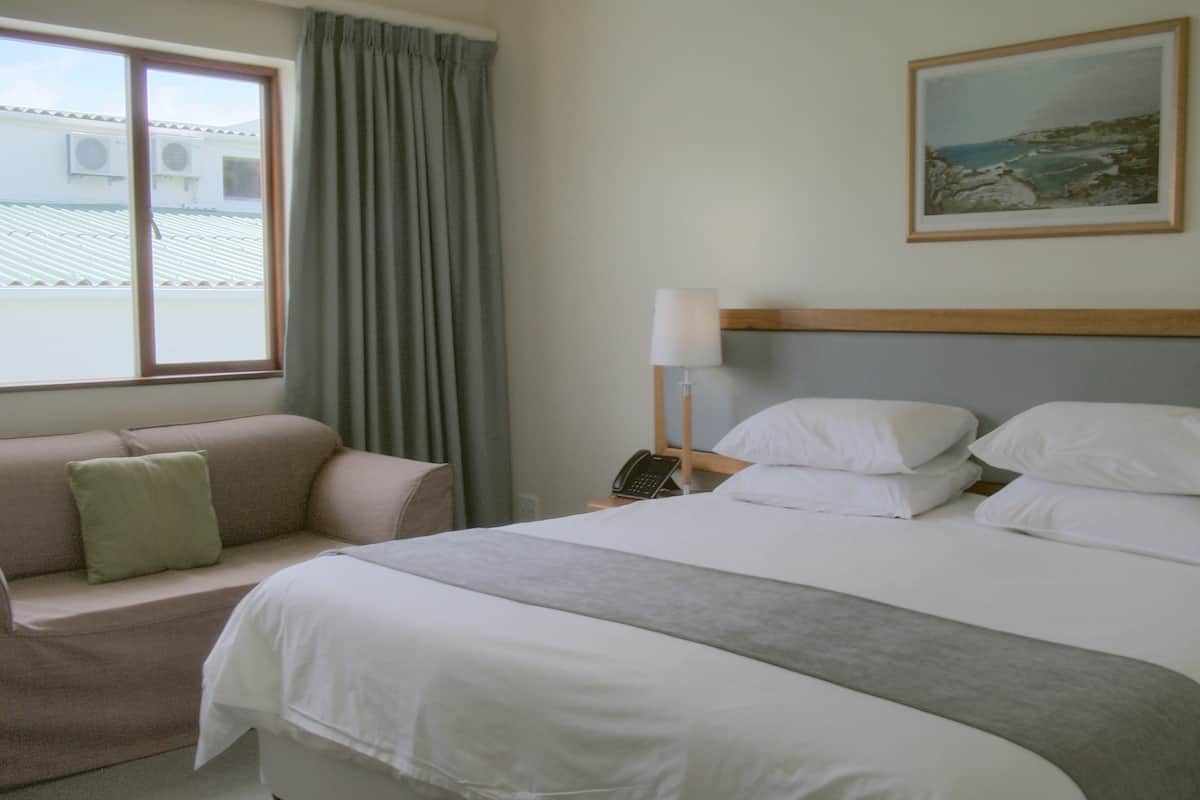 Economy Room (non-sea facing) | In-room safe, blackout drapes, iron/ironing board (on request)