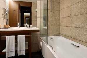 Bathtub, free toiletries, hair dryer, bathrobes