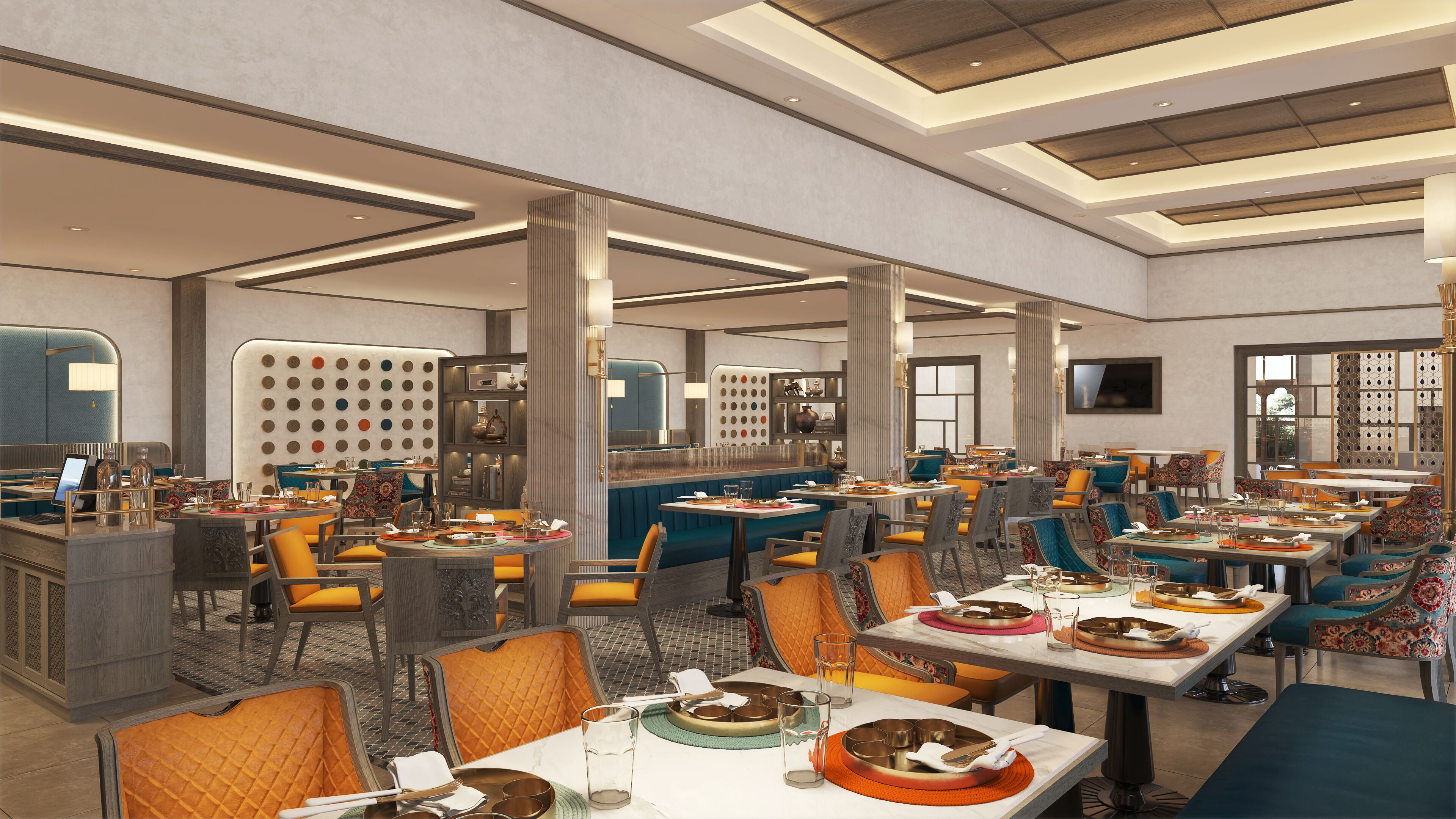 Ein modernes Restaurant mit hohen Decken, eingelassener Beleuchtung und verschiedenen Sitzgelegenheiten, darunter Sitzecken und Tische.