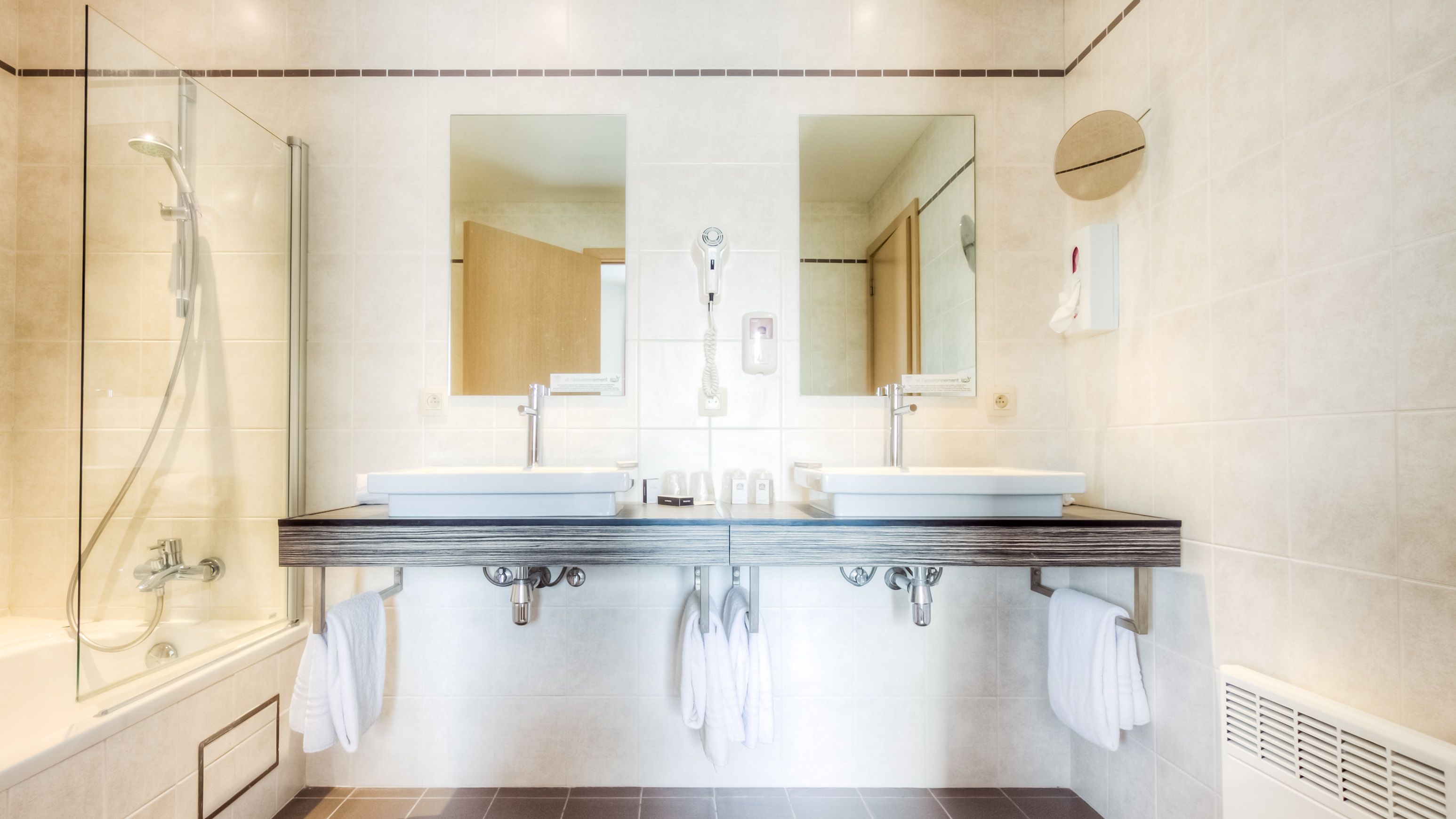 combined shower/bathtub, free toiletries, hair dryer, towels