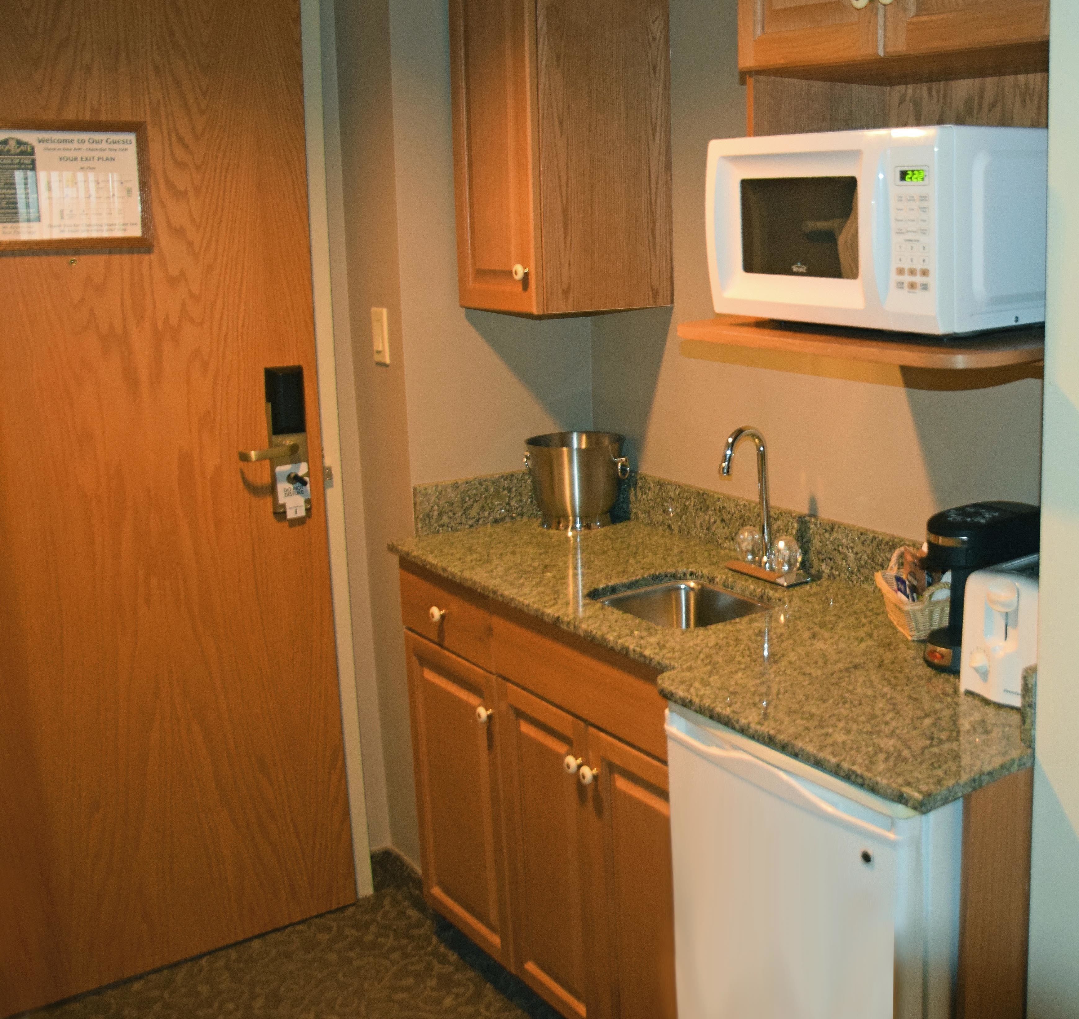 deluxe studio suite, 1 king bed, fireplace | private kitchenette | fridge, microwave, coffee/tea maker, electric kettle