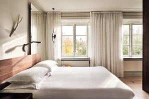 Standard Room, Garden View (Sea View) | Minibar, in-room safe, desk, laptop workspace - Hotel Skeppsholmen, Stockholm, a Member of Design Hotels (Stockholm)