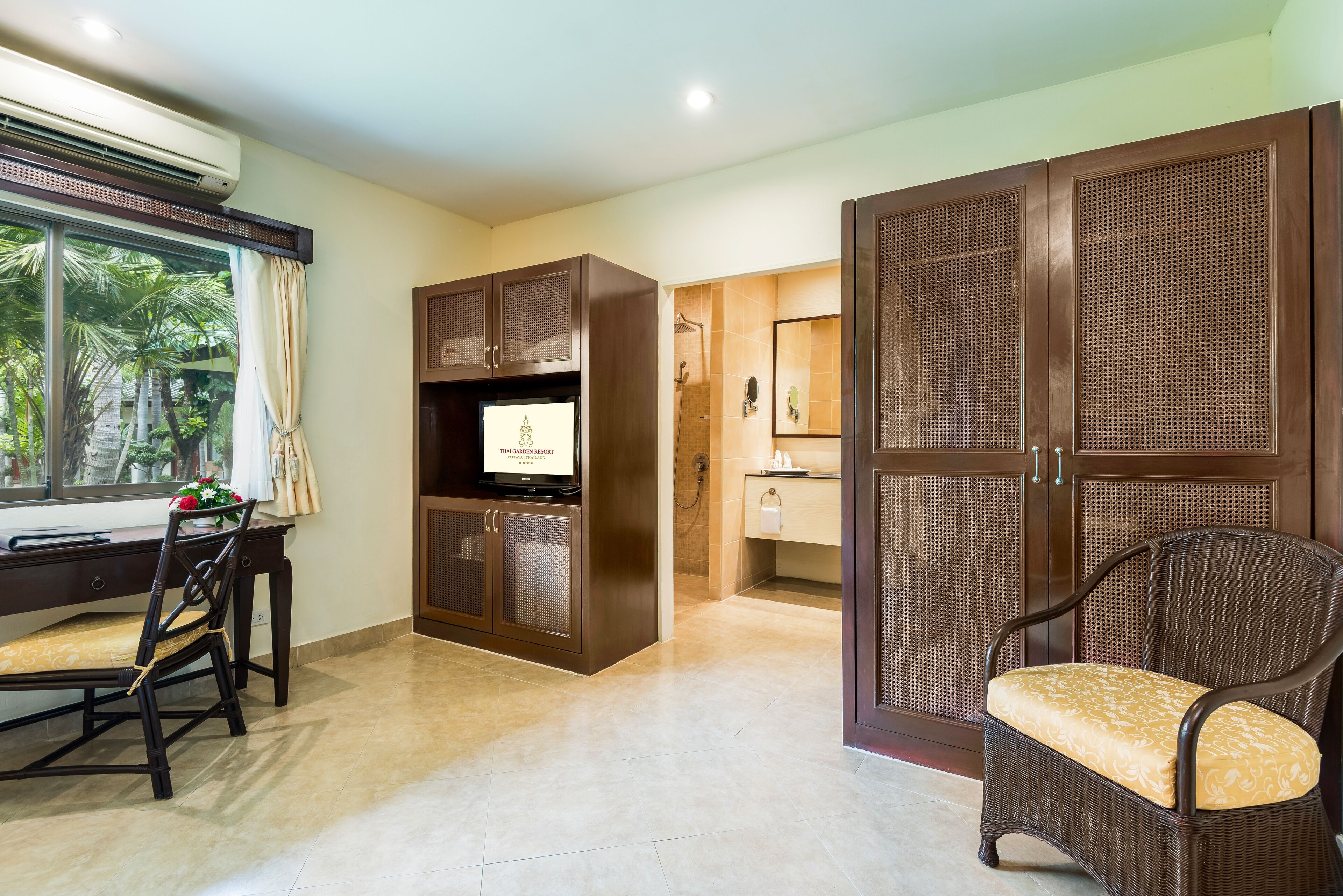 deluxe bungalow | living area | 32-inch lcd tv with cable channels, tv