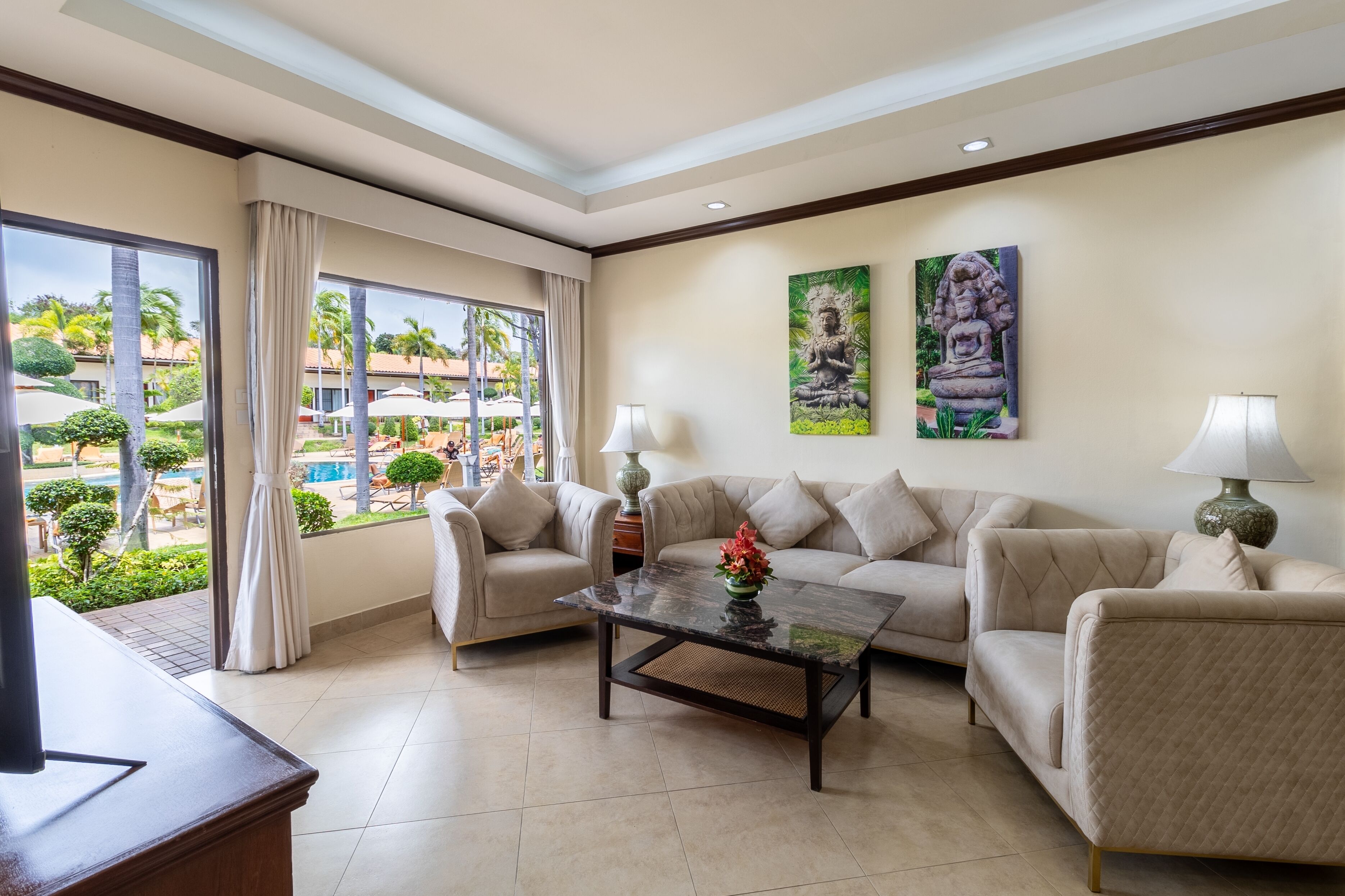 deluxe apartment, 2 single beds, poolside | living area | 32-inch lcd tv with cable channels, tv