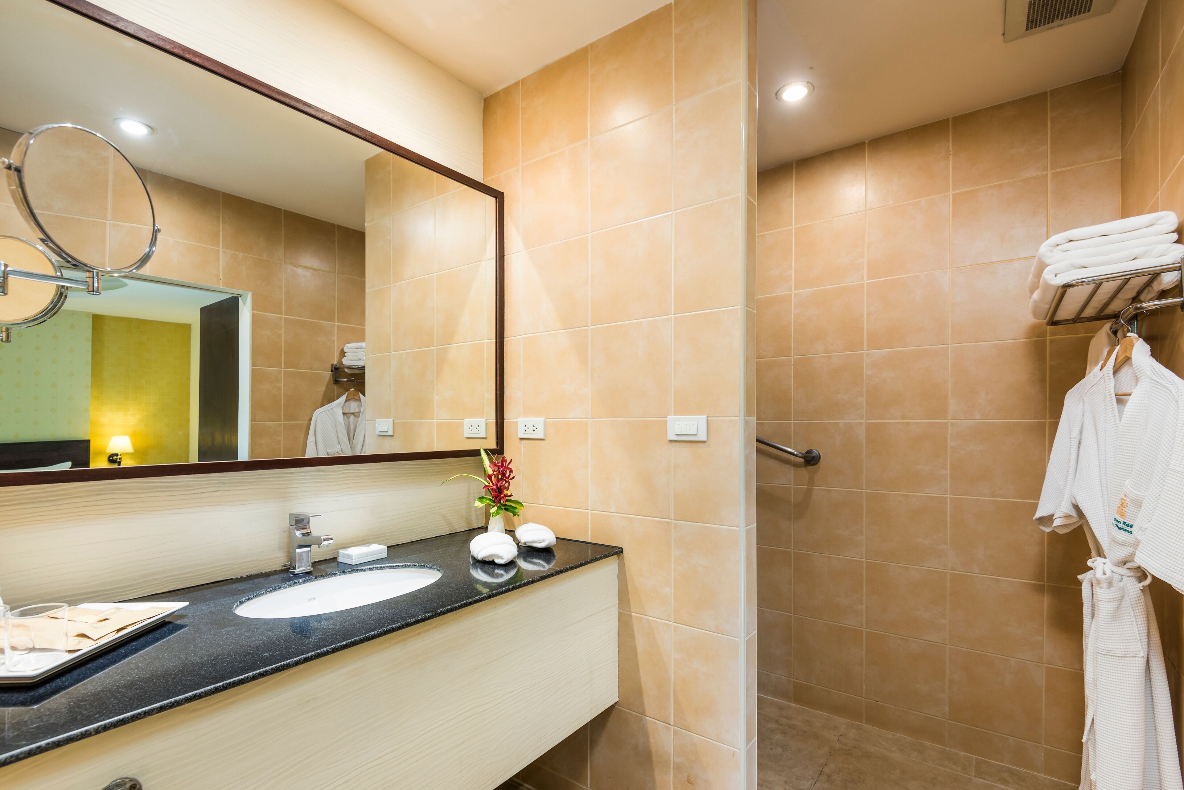 deluxe bungalow | bathroom | free toiletries, hair dryer, bathrobes, slippers