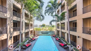 Outdoor pool, open 9:00 AM to 9:30 PM, pool loungers
