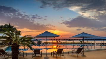 Outdoor pool, pool umbrellas, pool loungers