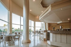 3 bars/lounges, 2 poolside bars, beach bar