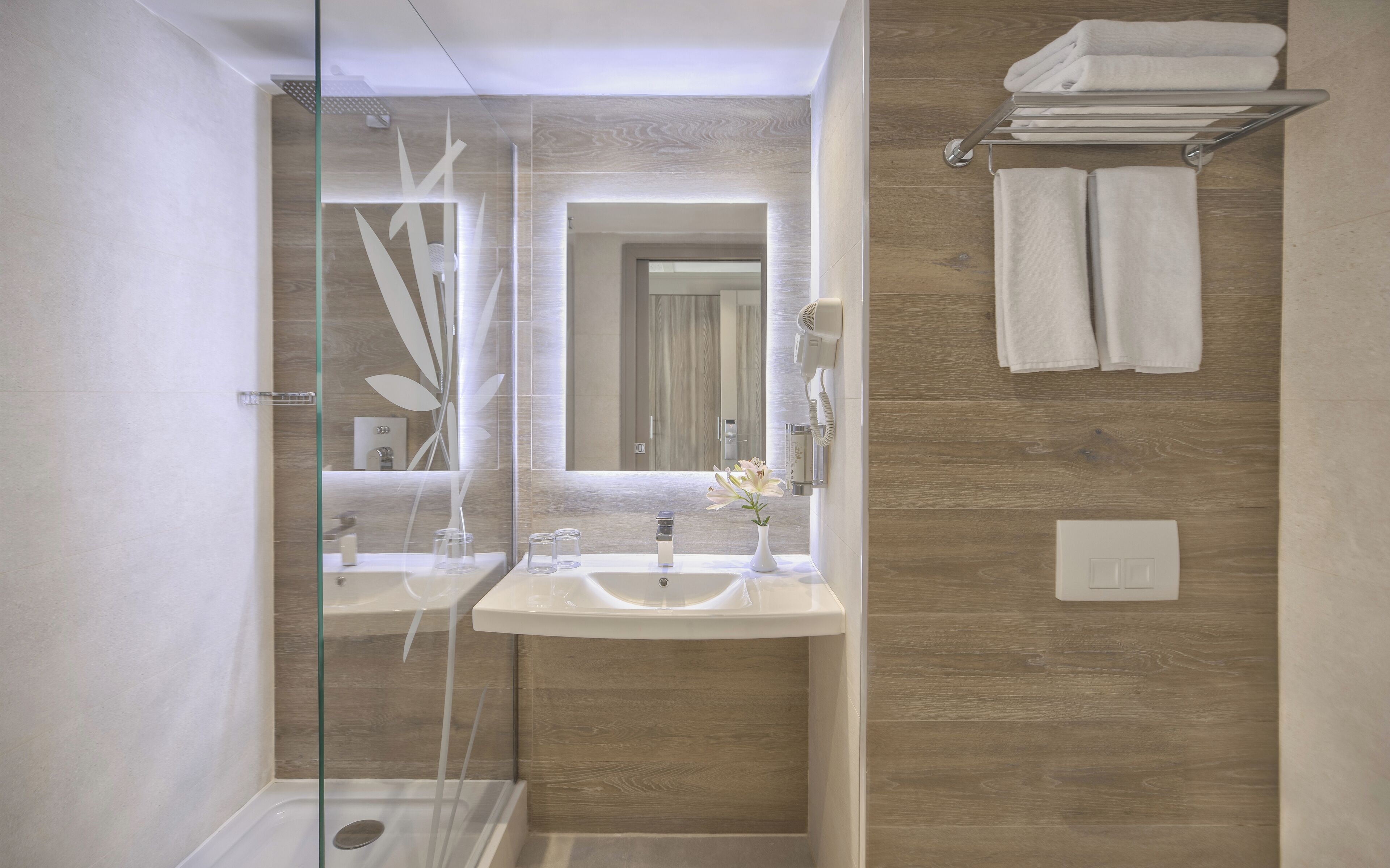 premium double room, garden view | bathroom | eco-friendly toiletries, towels
