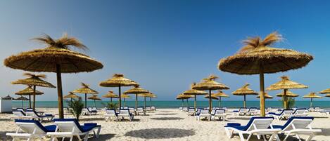 On the beach, white sand