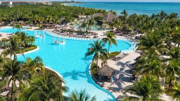 5 outdoor pools, pool umbrellas, pool loungers