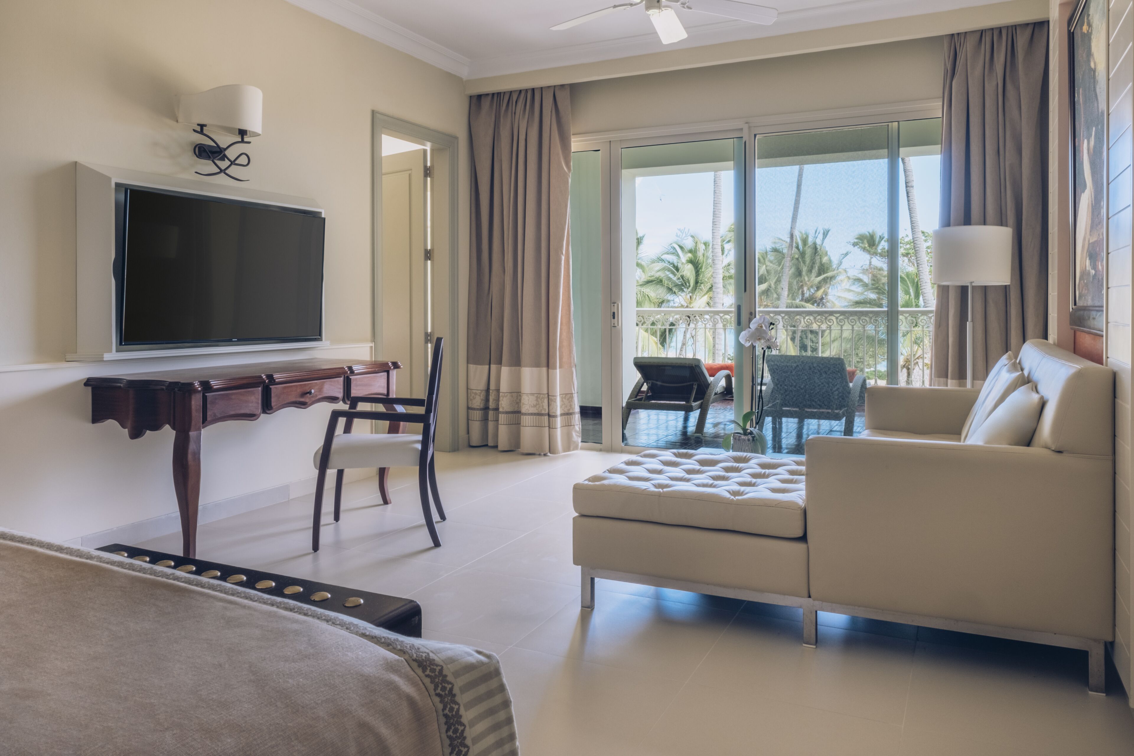 Suite, Oceanfront (Butler) | Living area | 55-inch flat-screen TV with satellite channels, TV