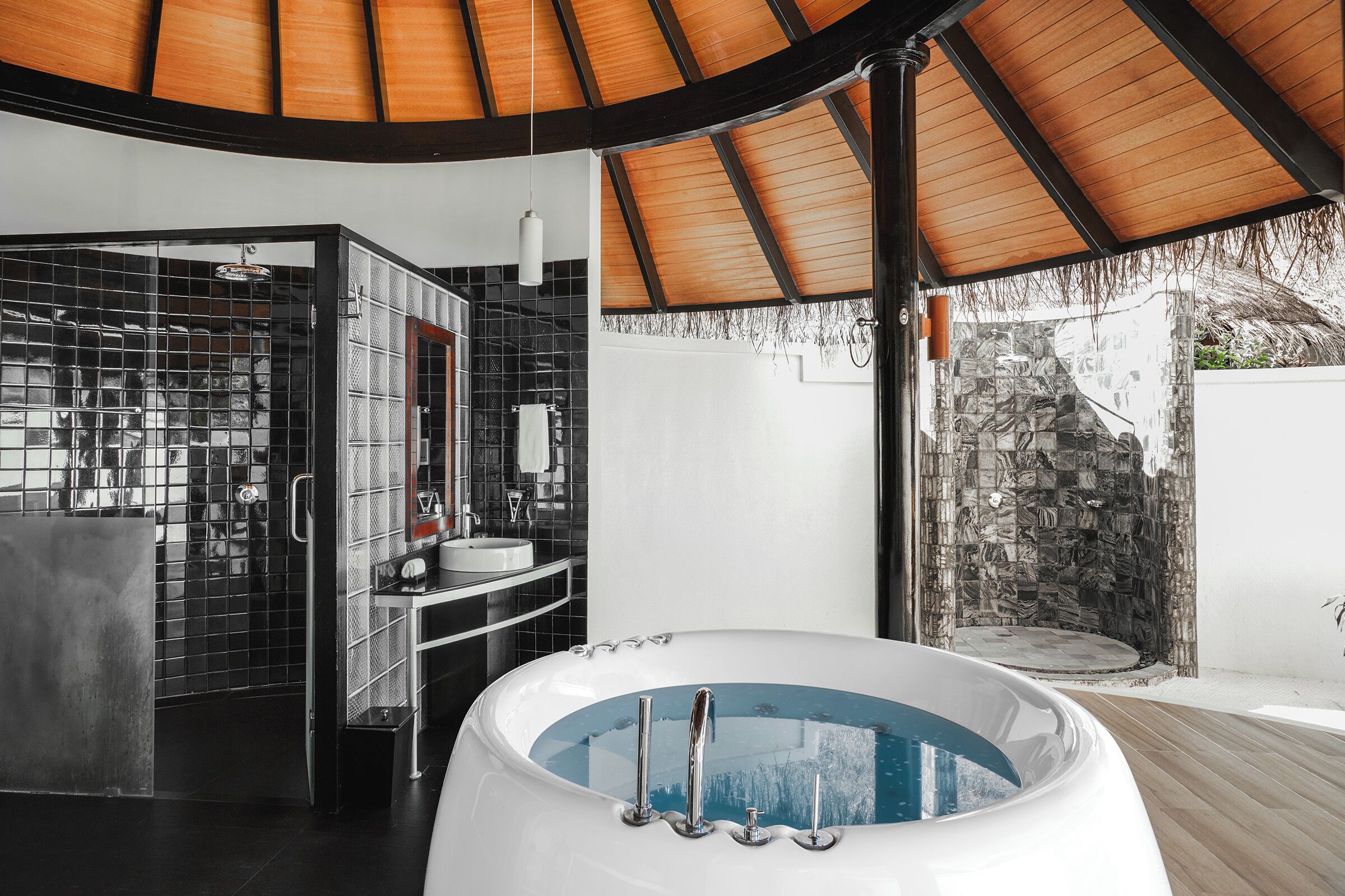 deluxe beach villa free seaplane transfer for 2 guests (7+nights, stays til 26 dec'25) | bathroom | eco-friendly toiletries, hair dryer, bathrobes, slippers