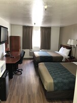 Tabla de planchar con plancha, wifi gratis y ropa de cama