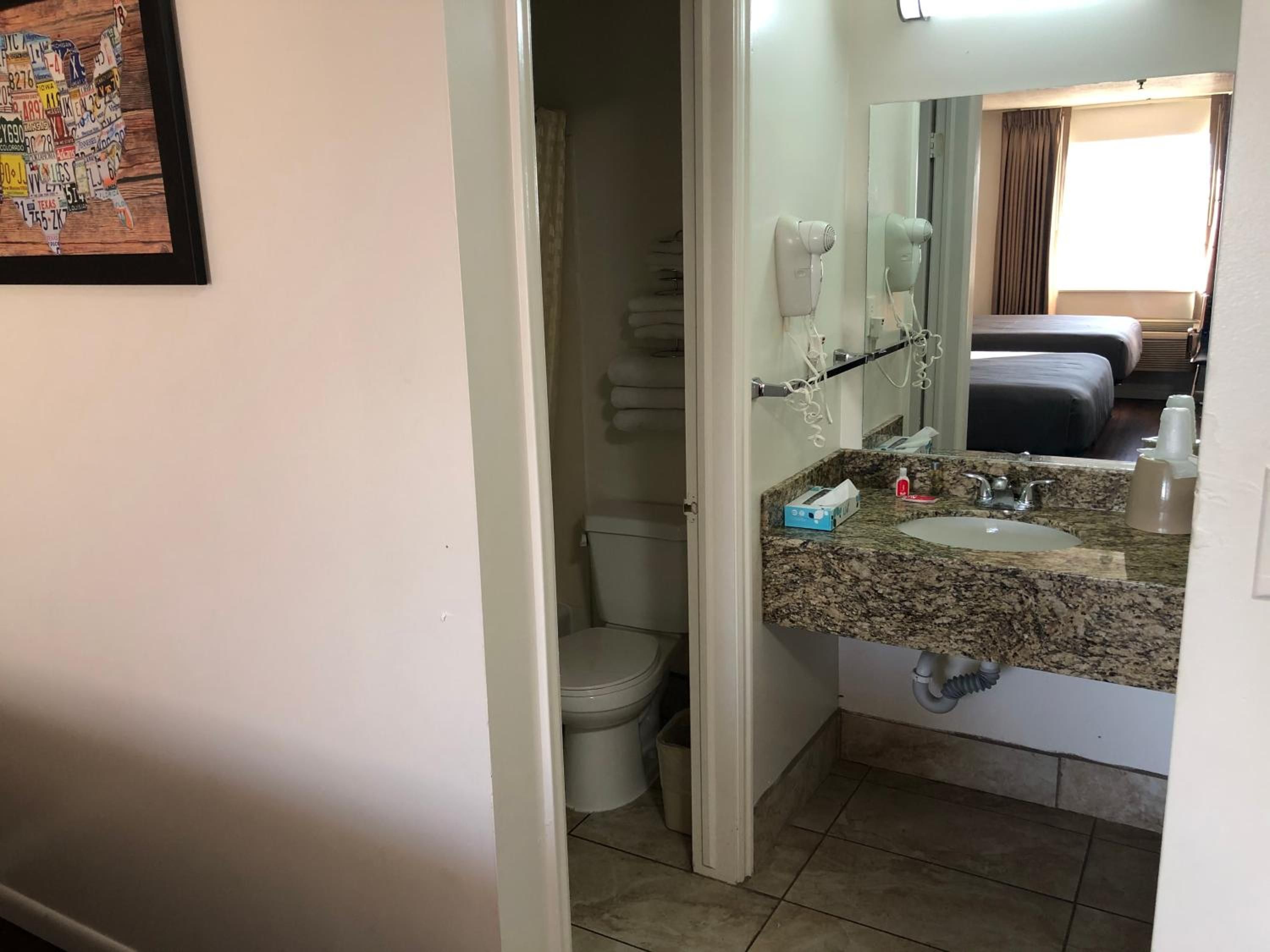Rainfall showerhead, hair dryer, towels, soap