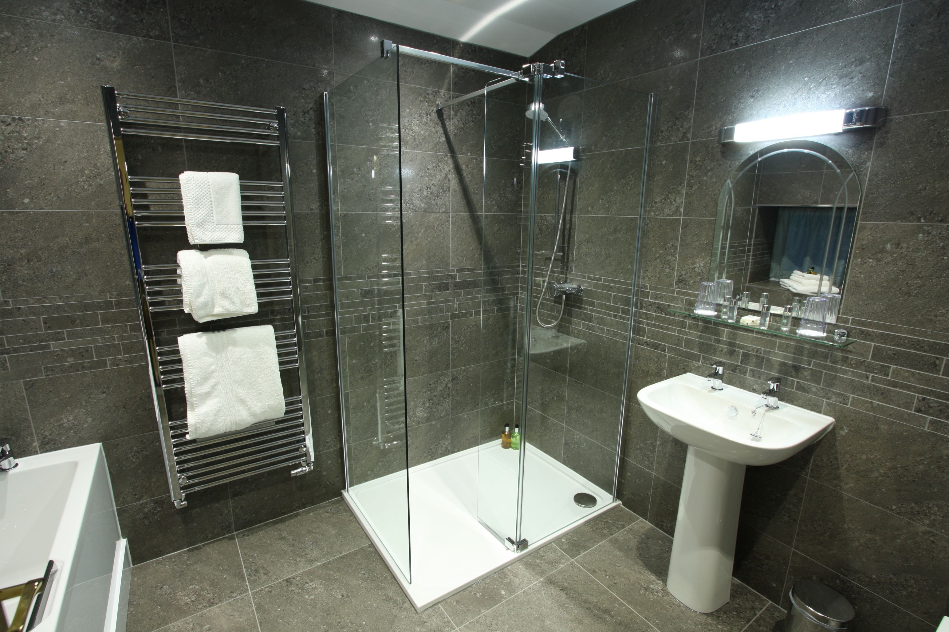 family room | bathroom | combined shower/bathtub, hair dryer, towels