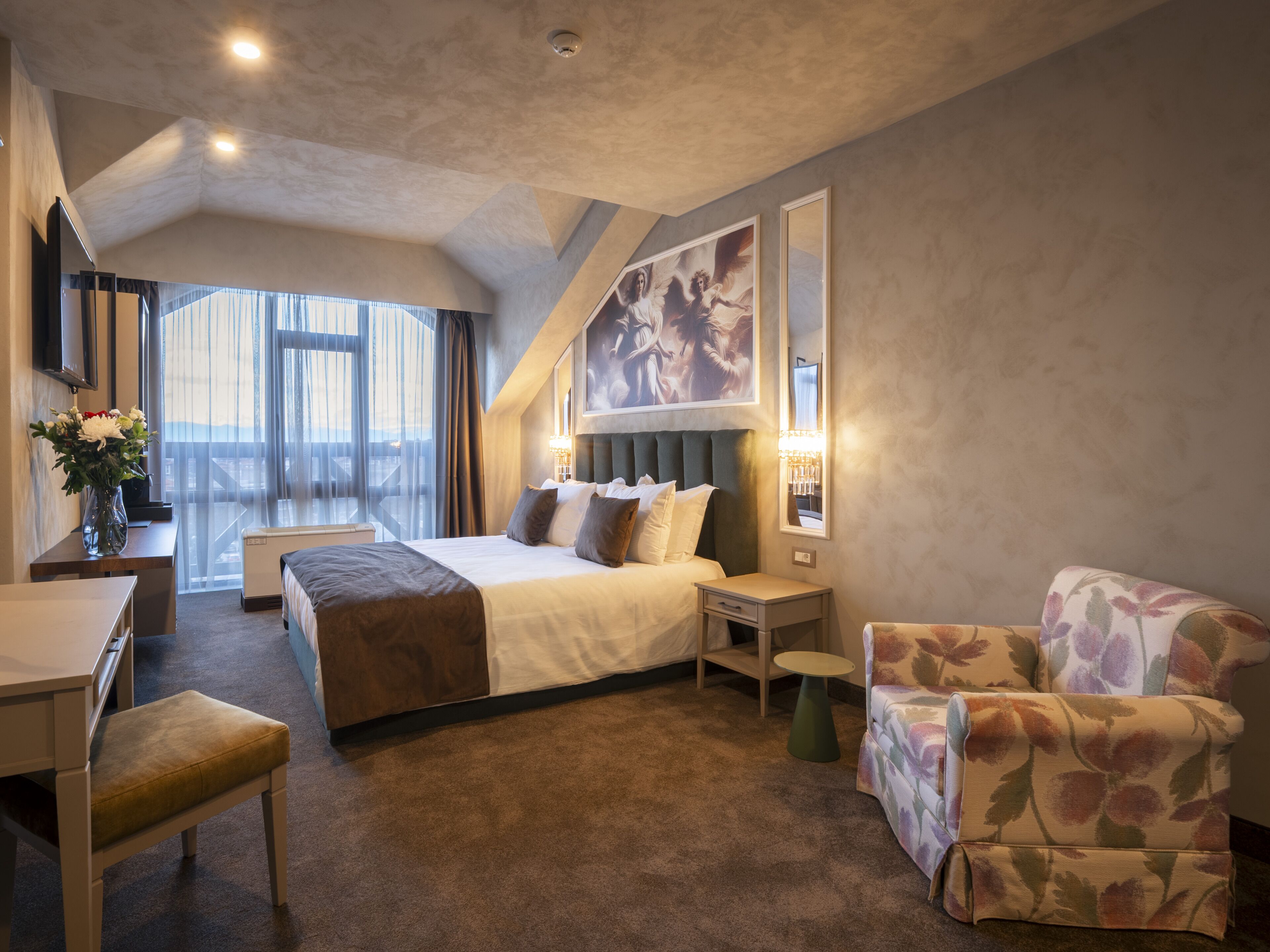 Deluxe Room | Premium bedding, minibar, in-room safe, individually decorated