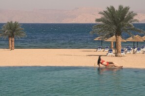 Private beach, sun loungers, beach umbrellas, beach towels