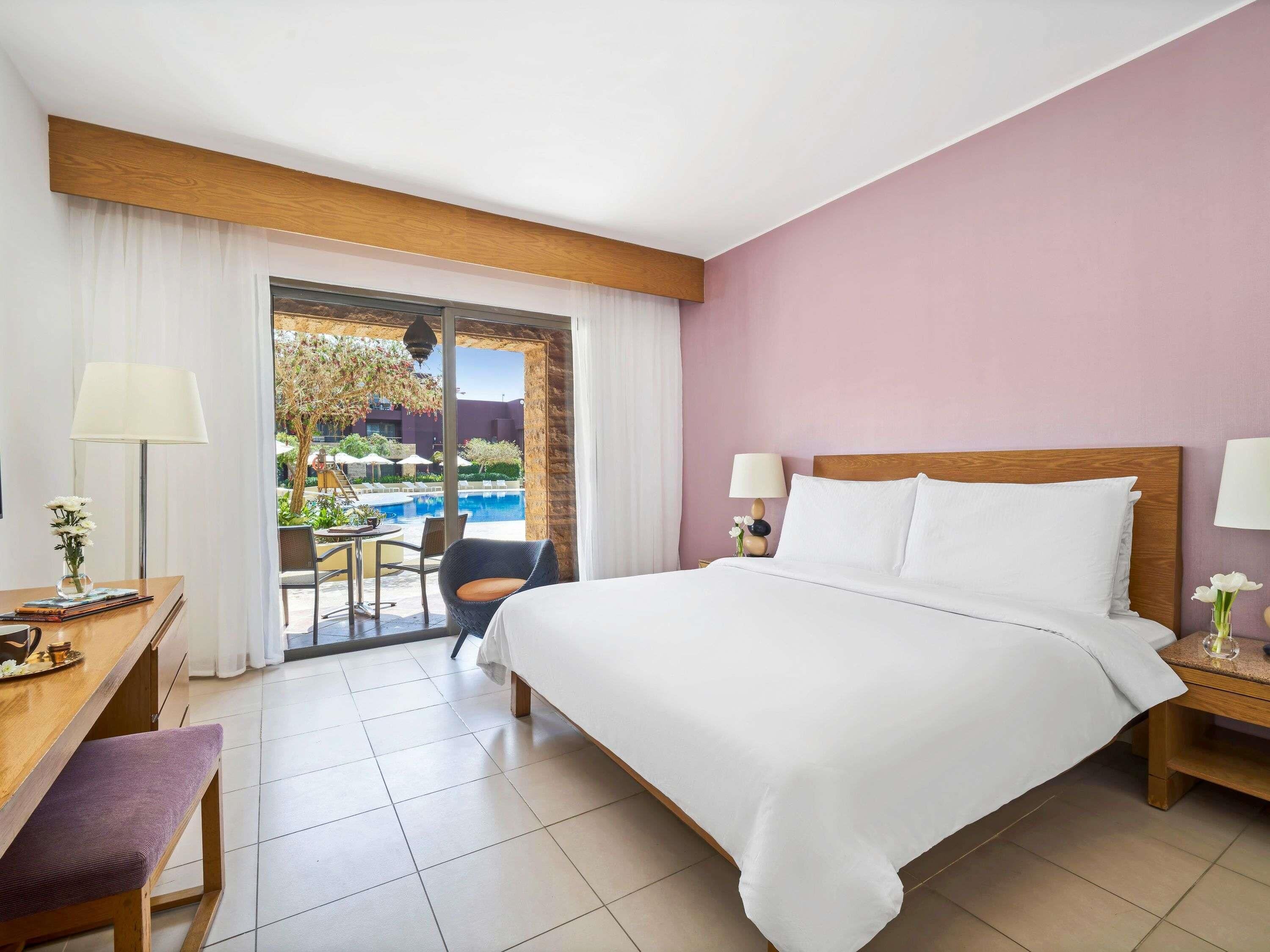 Down comforters, pillowtop beds, free minibar items, in-room safe