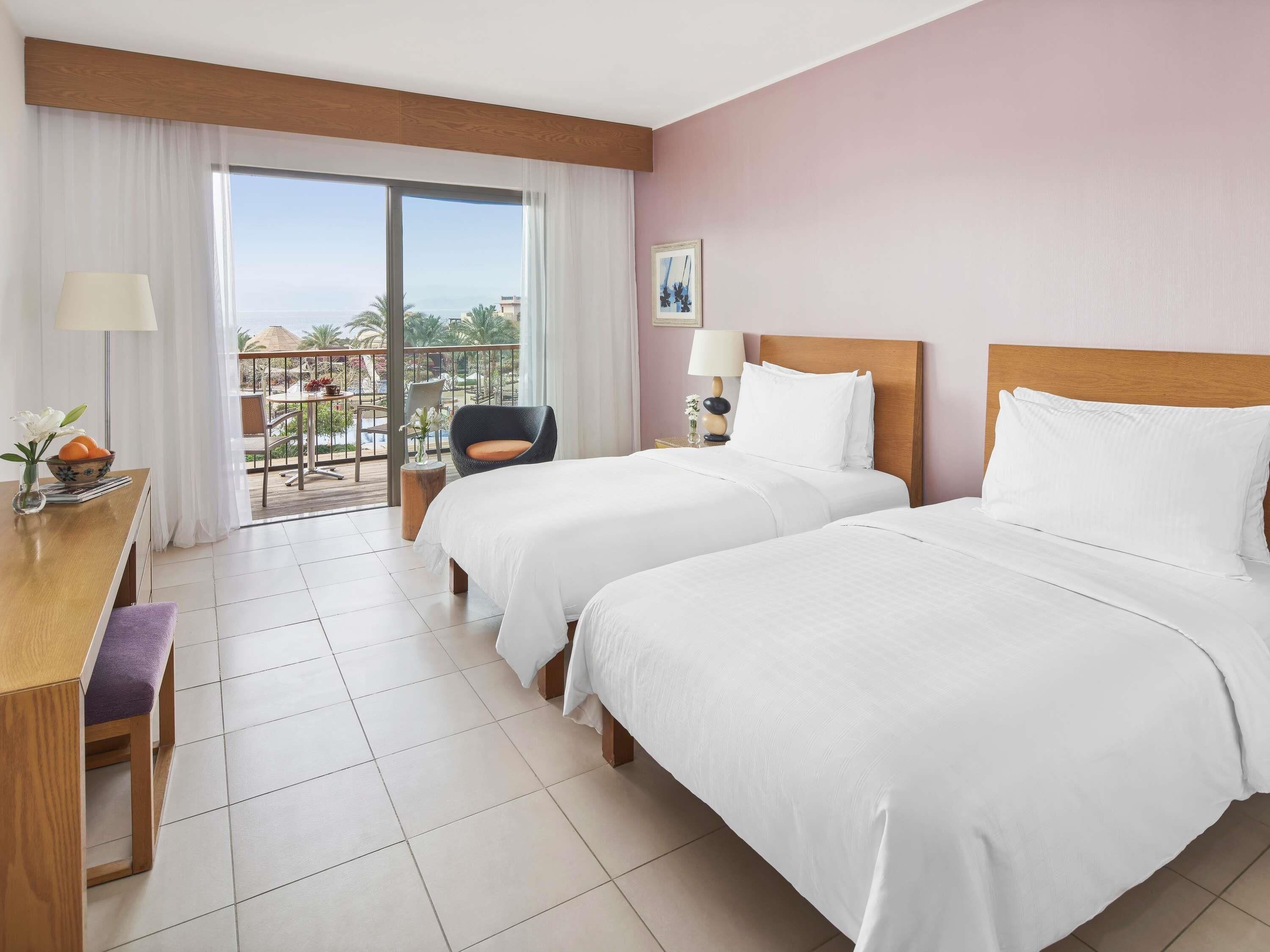 Down comforters, pillowtop beds, free minibar items, in-room safe