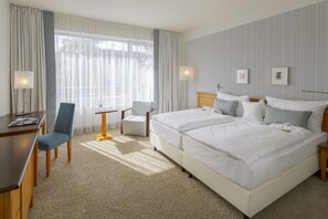 Hypo-allergenic bedding, minibar, in-room safe, desk