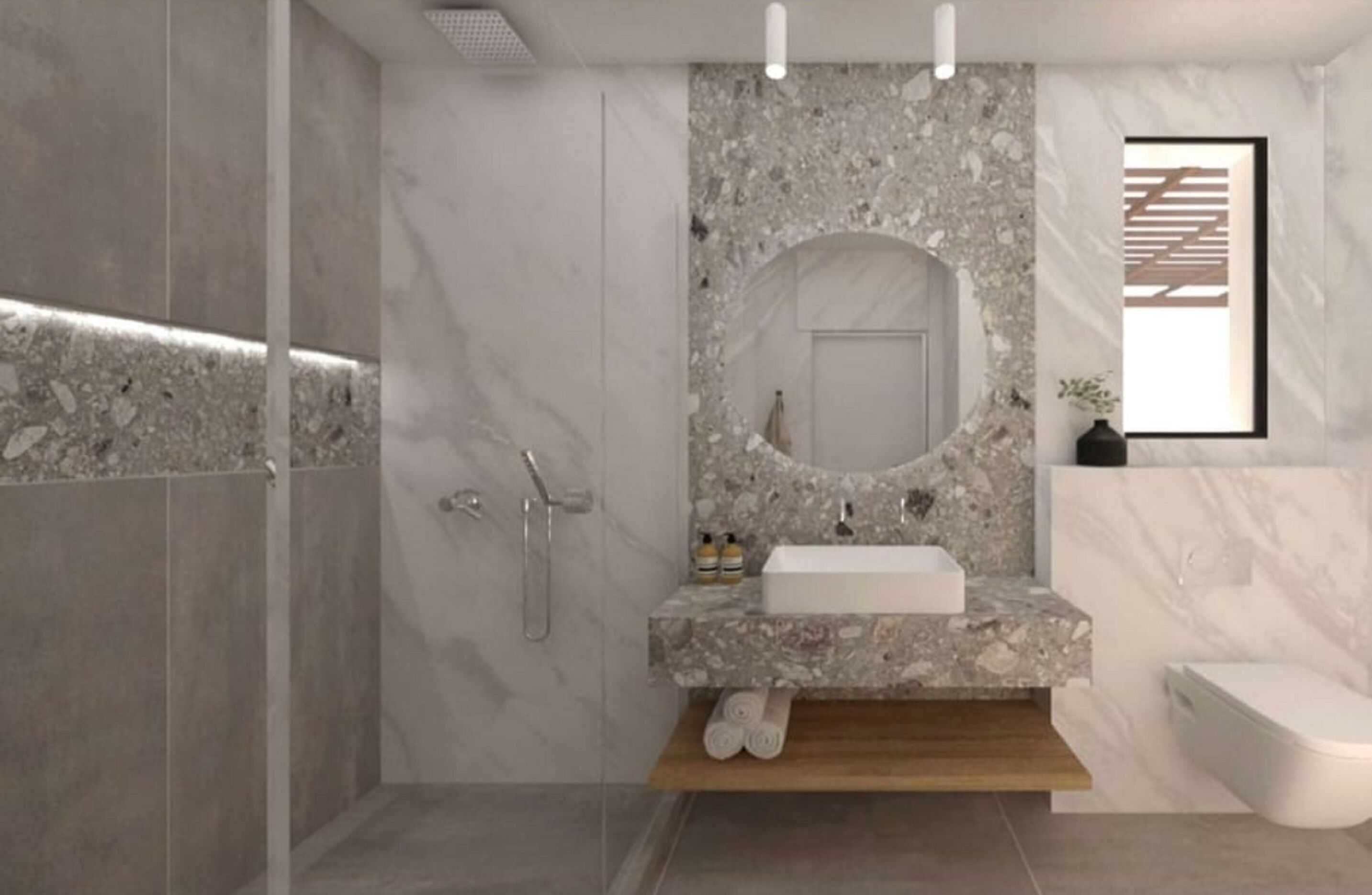 Une salle de bain moderne avec un meuble-lavabo en marbre, une douche et des toilettes.