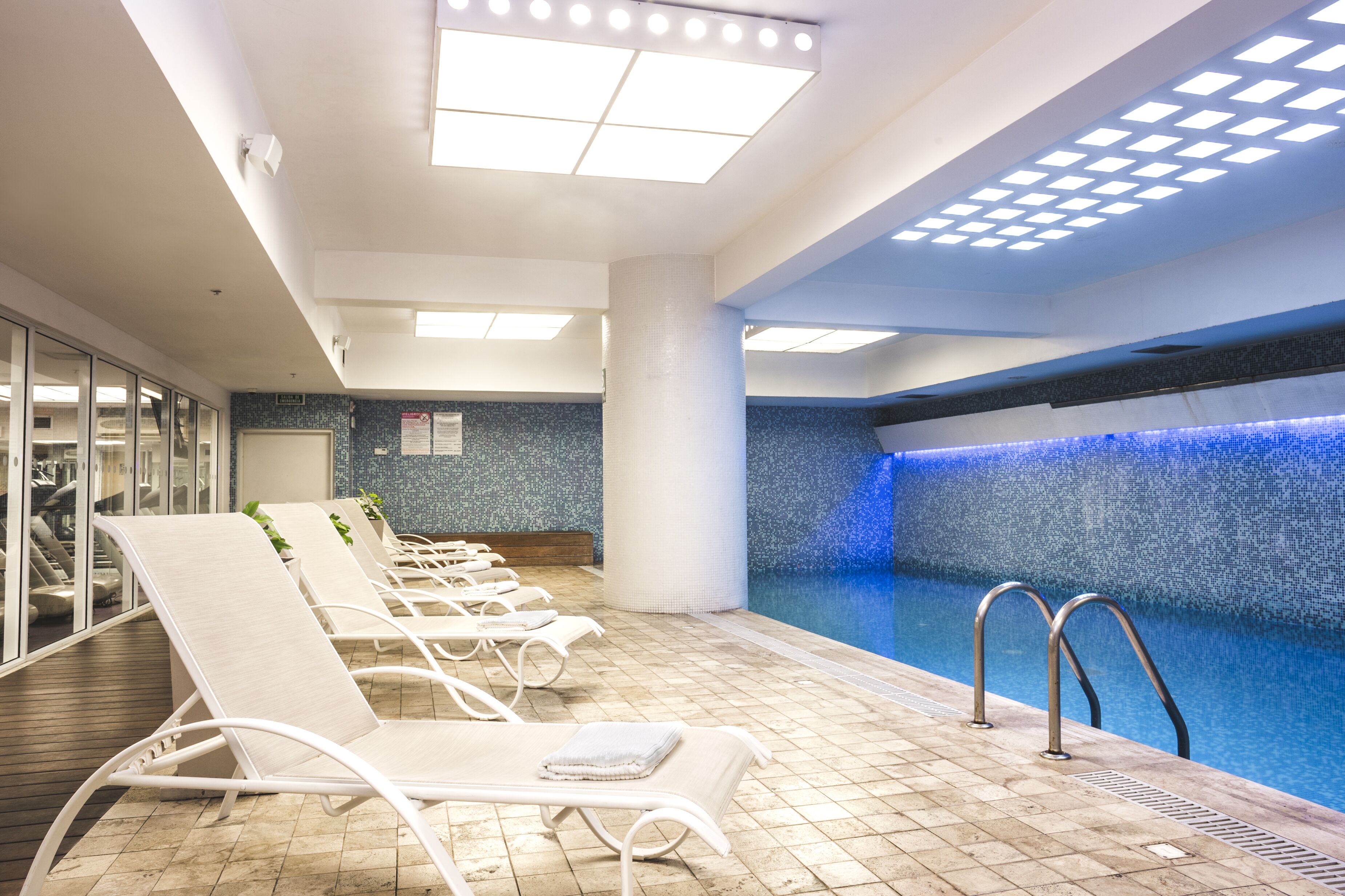 indoor pool, open 6 am to 11 pm, pool loungers