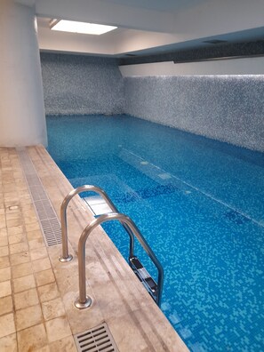 Indoor pool, open 6 AM to 11 PM, sun loungers