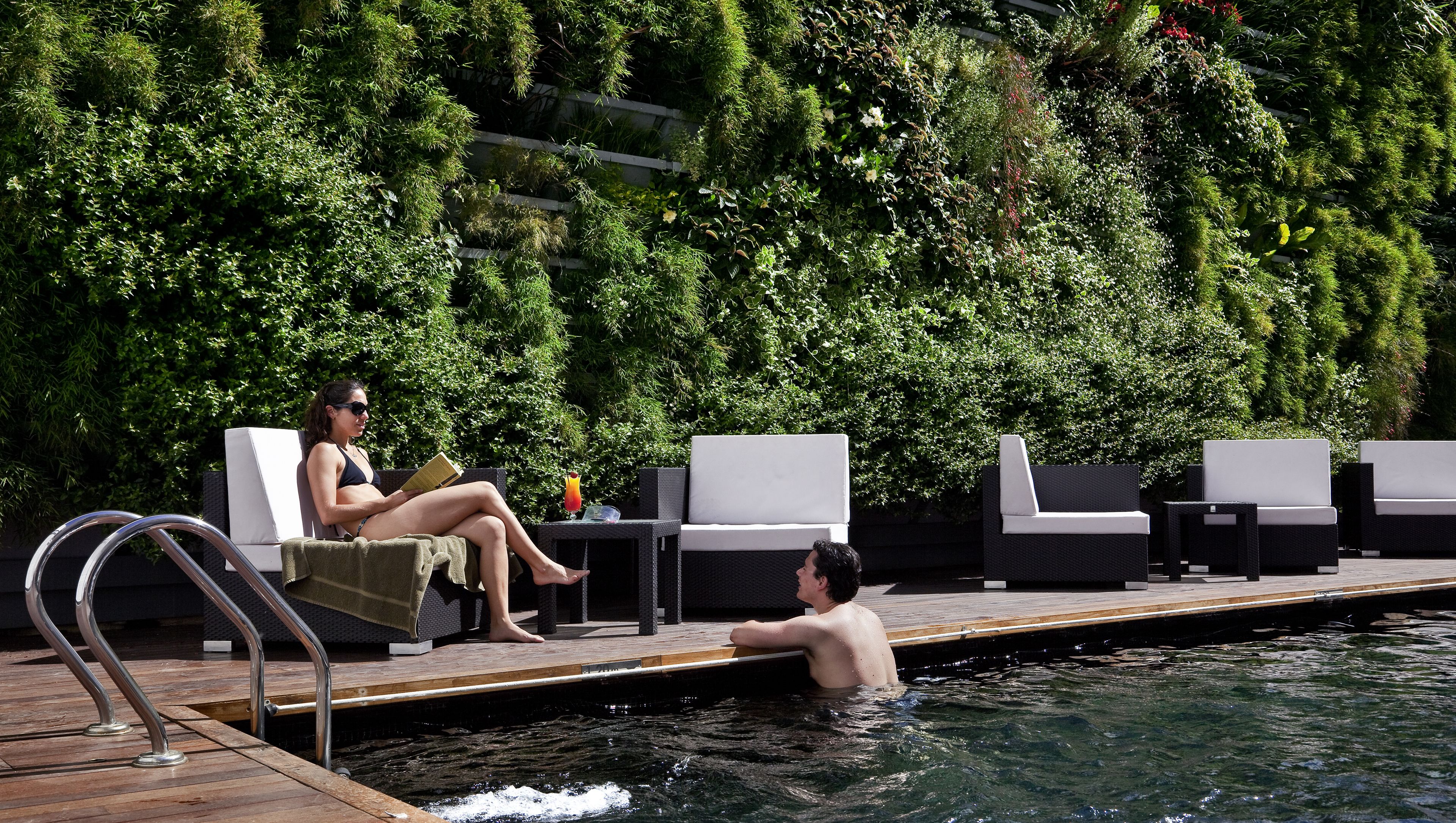 seasonal outdoor pool, open 10 am to 7 pm, pool loungers