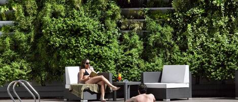 Seasonal outdoor pool, open 10 AM to 7 PM, sun loungers