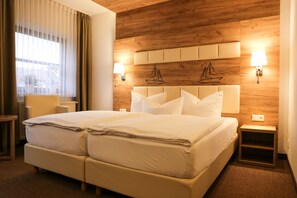 Literie hypoallergénique, minibar, coffres-forts dans les chambres