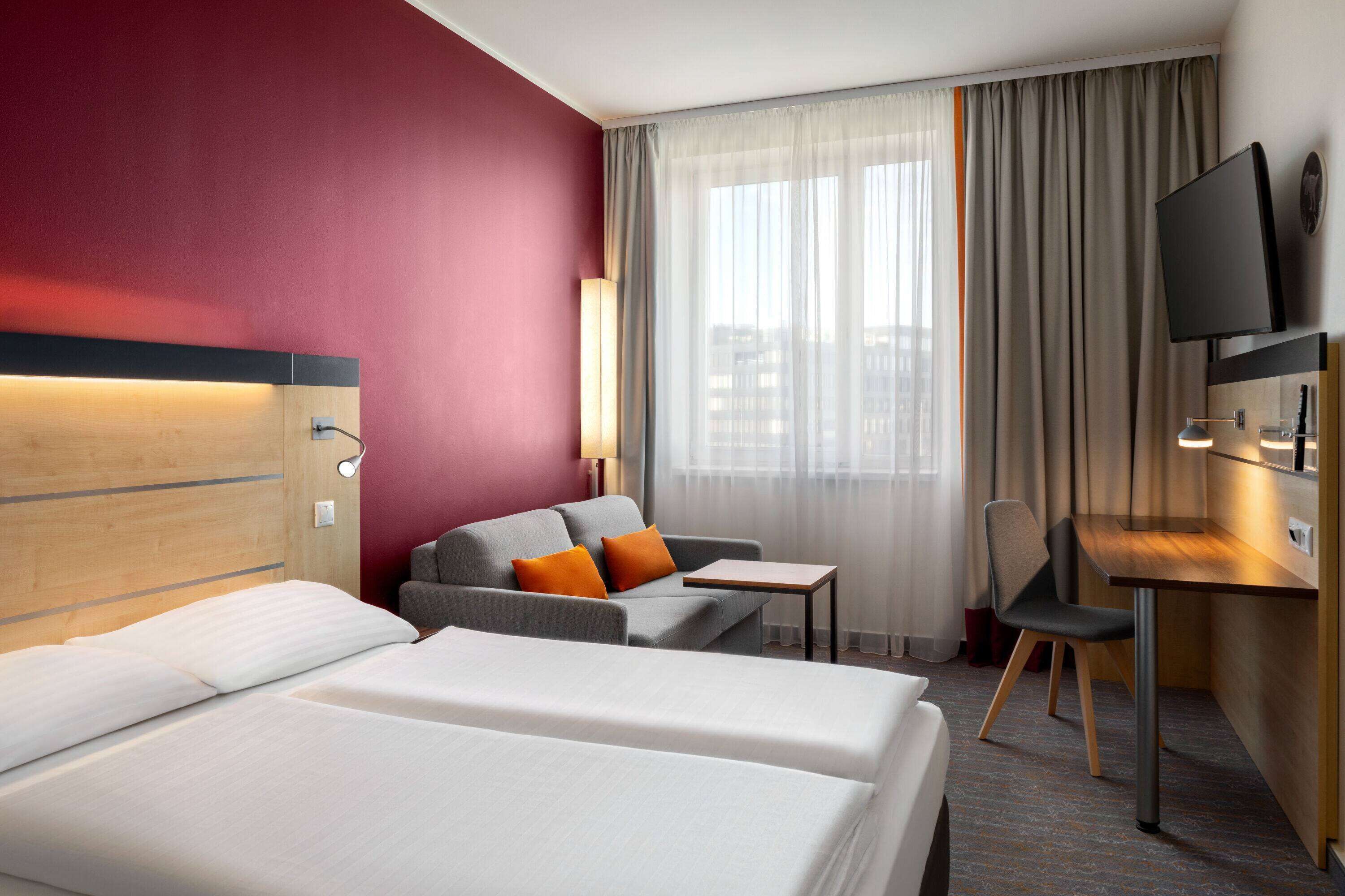 family room | hypo-allergenic bedding, desk, laptop workspace, blackout curtains