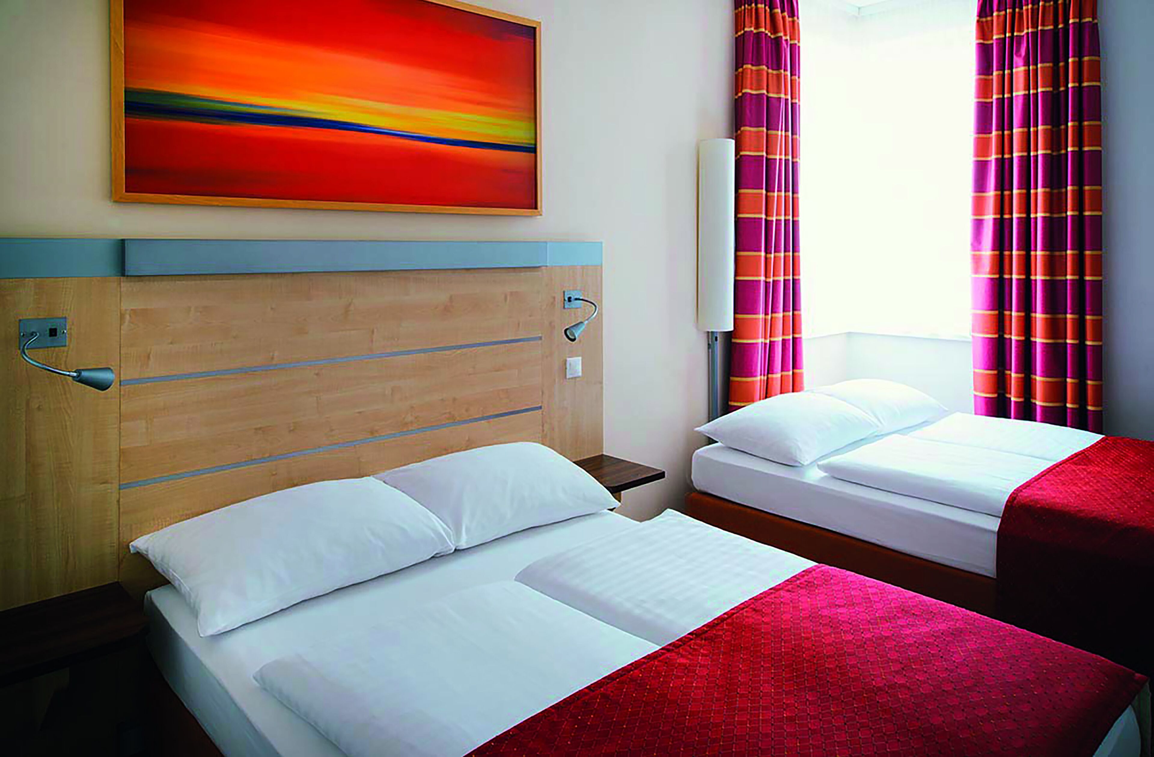 hypo-allergenic bedding, desk, laptop workspace, blackout curtains