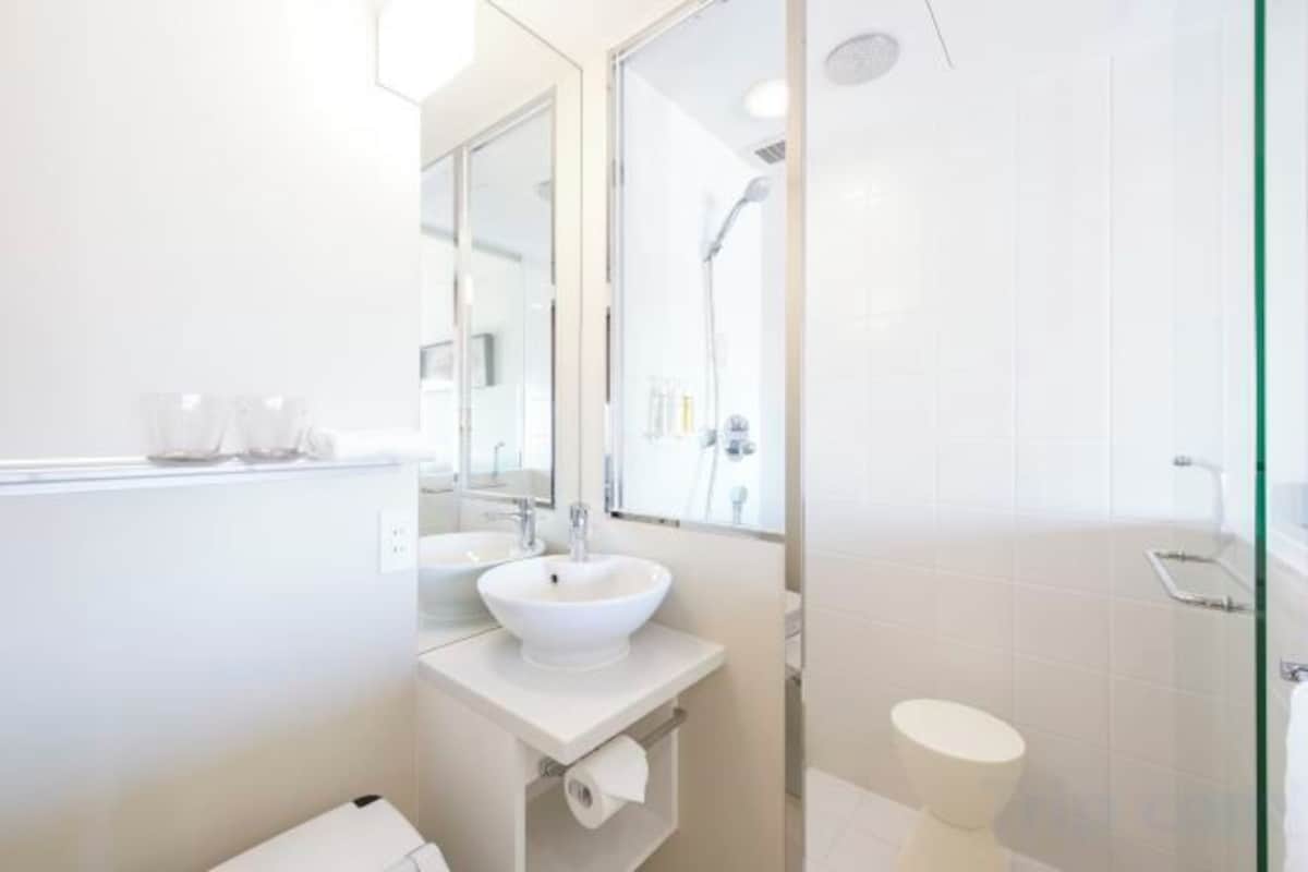 Bathroom | Shower, rainfall showerhead, eco-friendly toiletries, hair dryer