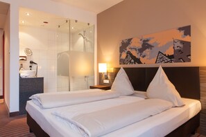 Roupas de cama premium, camas Select Comfort, frigobar