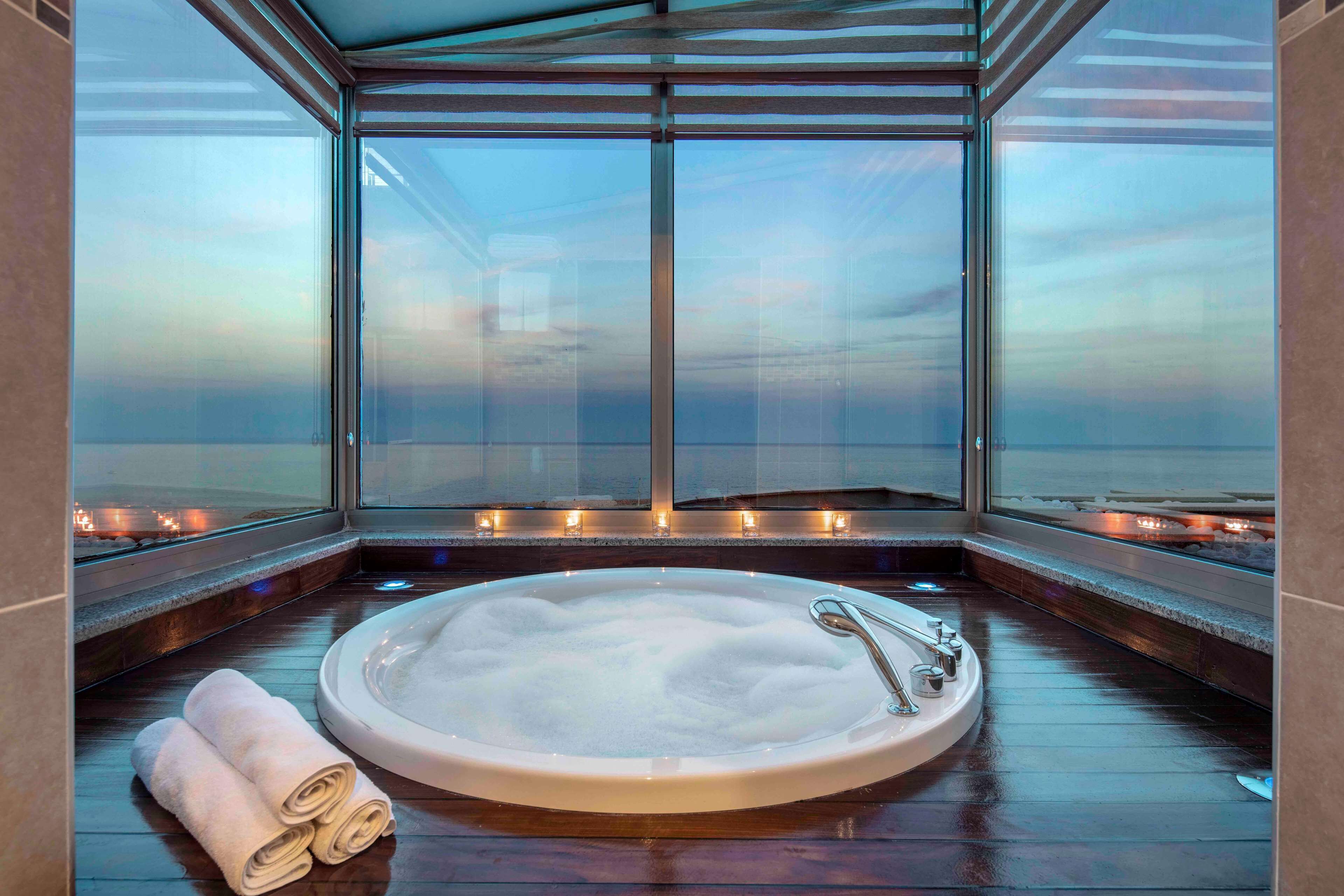 eco-friendly toiletries, hair dryer, slippers, towels