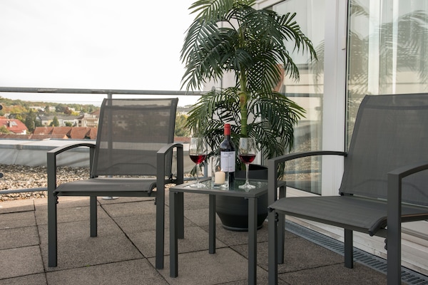 Penthouse, 1 kingsize bed met slaapbank | Uitzicht vanuit de kamer