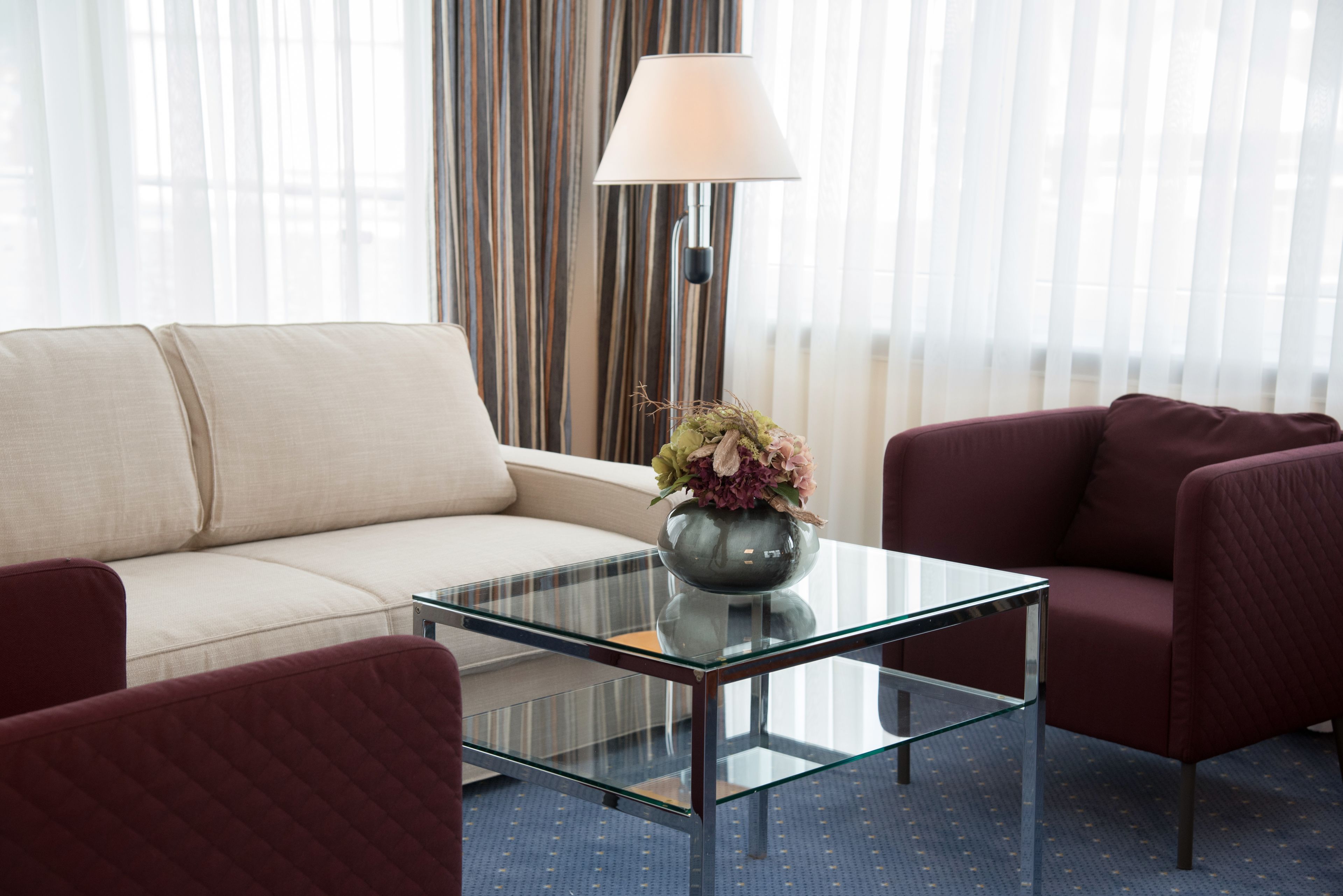 penthouse, 1 king bed | living area | flat-screen tv