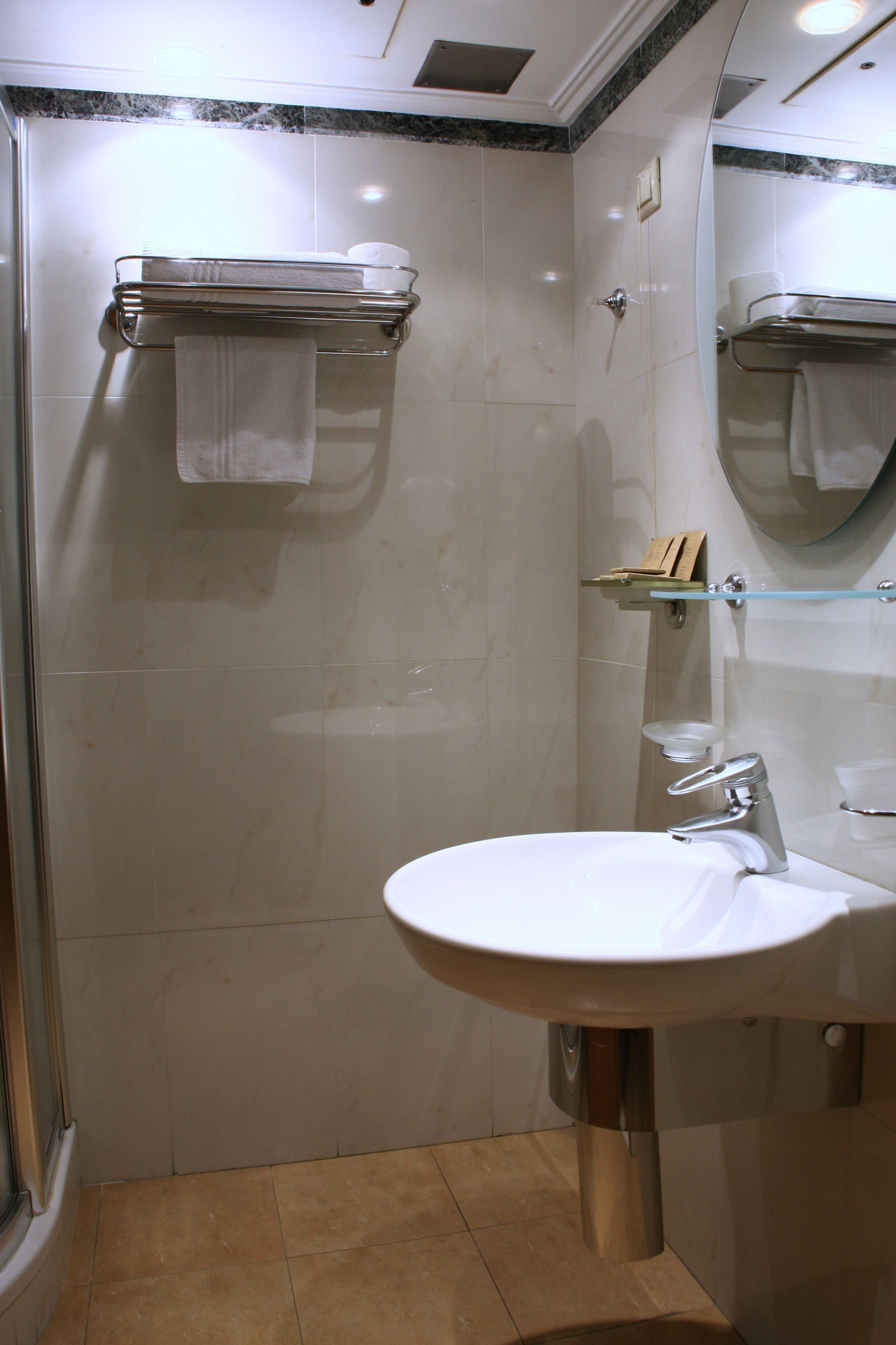 economy single room | bathroom | hair dryer, towels