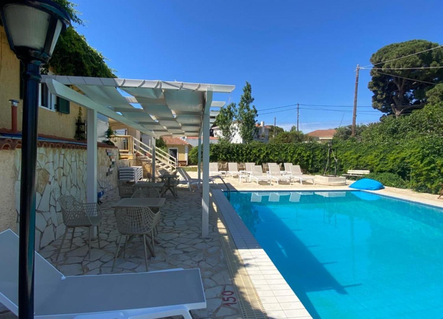 seasonal outdoor pool, open 10:00 am to 7:00 pm, pool umbrellas