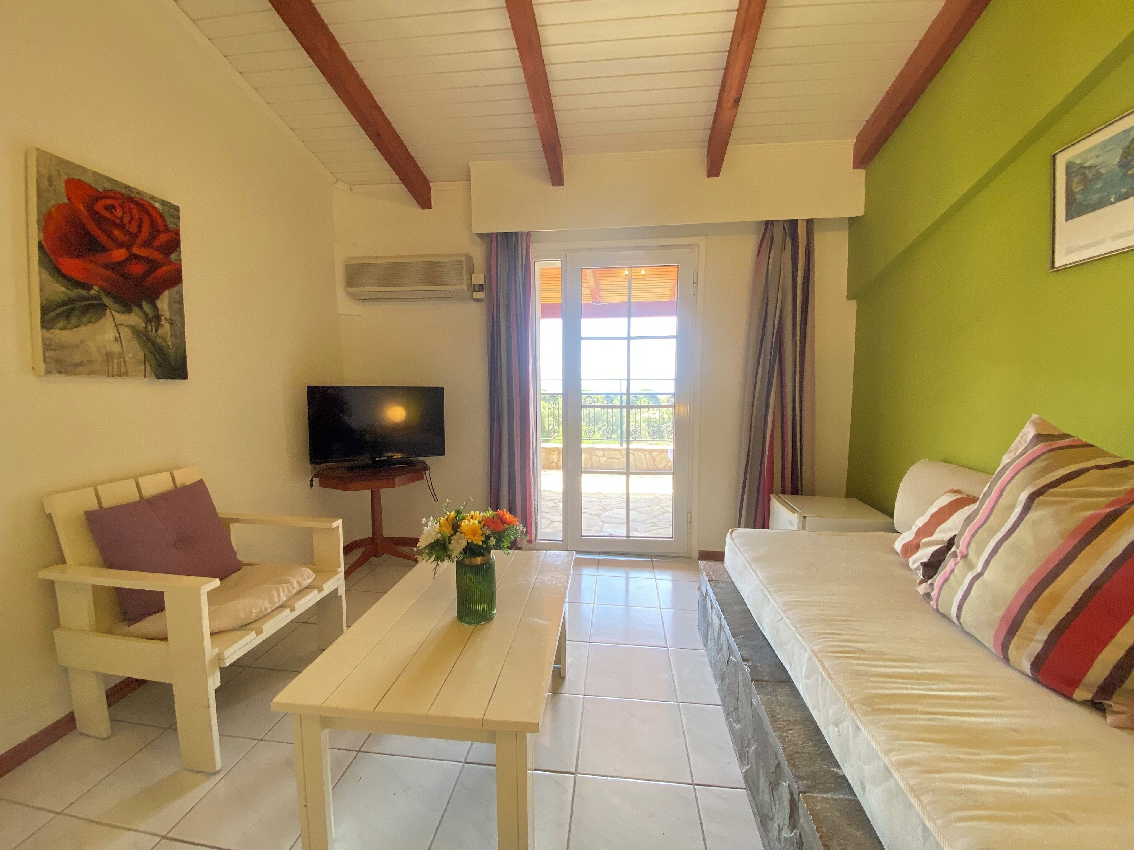 family room, 2 bedrooms, sea view | 1 bedroom, minibar, in-room safe, free cots/infant beds