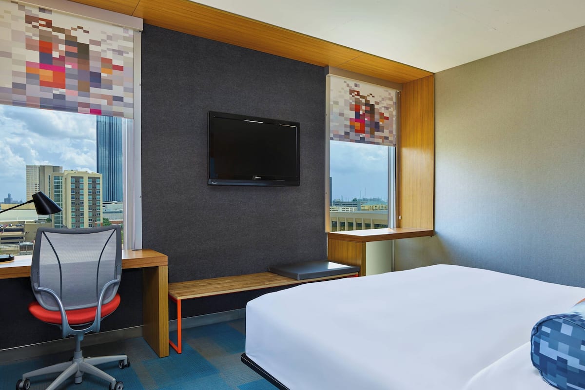 Premium bedding, down duvets, in-room safe, desk