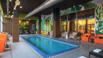 Indoor pool, open 8:00 AM to 10:00 PM, pool loungers
