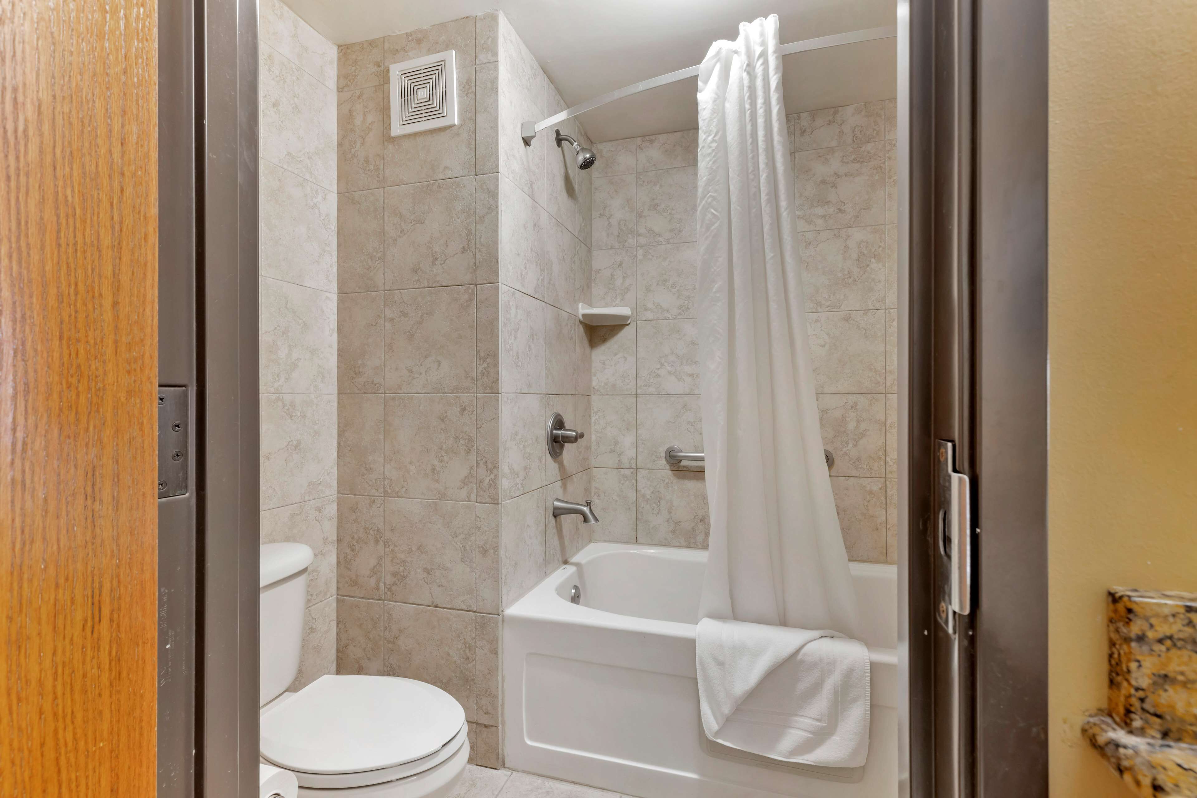 suite, multiple beds, non smoking | bathroom | free toiletries, hair dryer, towels