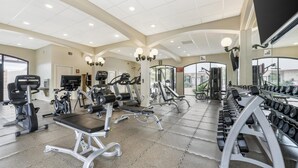 A gym with treadmills, weight machines, and dumbbells. - Best Western Plus Swiss Chalet Hotel & Suites (Pecos)