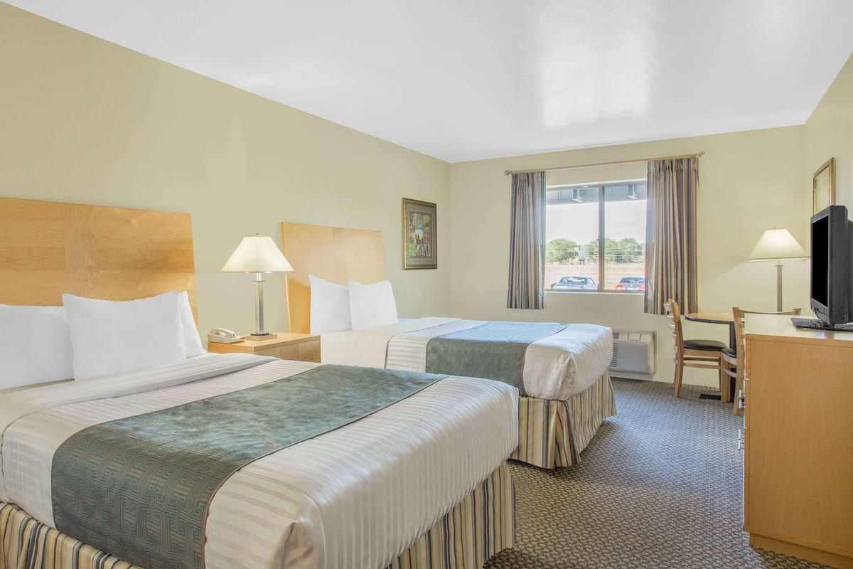 Double Room, 2 Double Beds | Blackout drapes, iron/ironing board, free cribs/infant beds