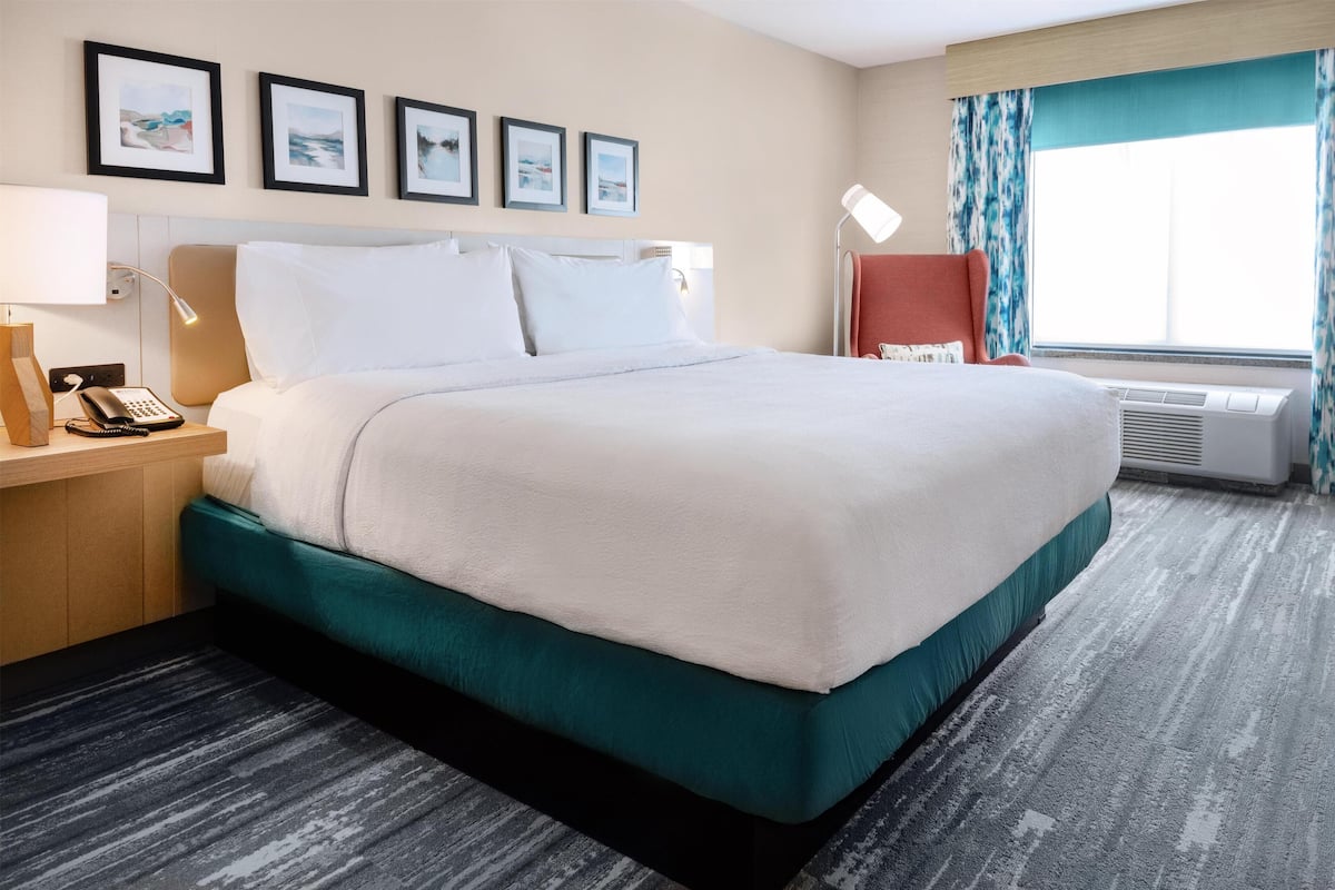 Down comforters, desk, blackout drapes, iron/ironing board
